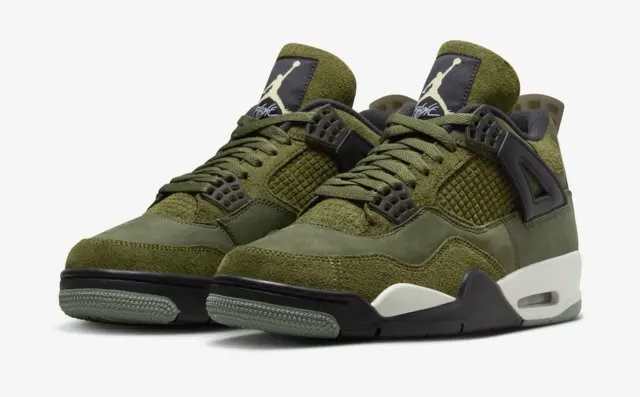 Side view of green and black Air Jordan sneakers.